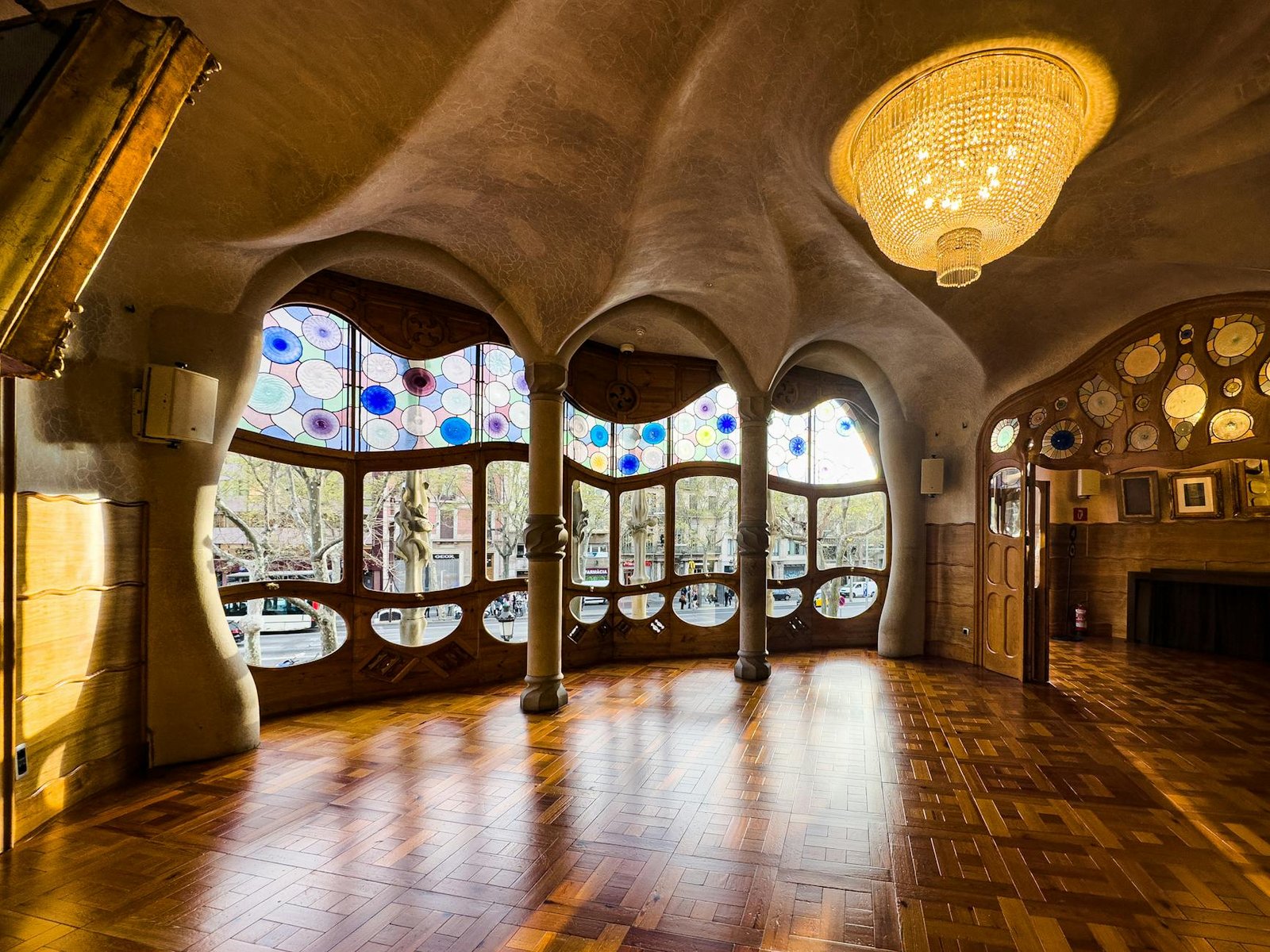 room with decorative ceiling and big windows in barcelona spain