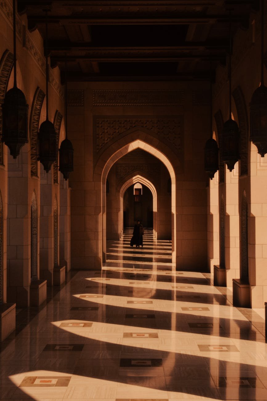 architectural shadows in sultan qaboos mosque corridor