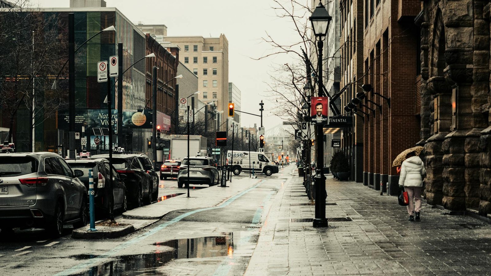 rainy day on sainte catherine street montreal